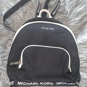 Michael kors black and white backpack